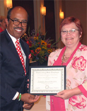 photo of Tamara Ellenbecker with Certificate