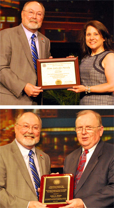 Photo of Kim Needy and John White with plaques
