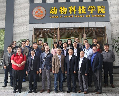  group photo of researchers in front of sign with Chinese letters