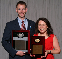 Photo of Russell Meller and Kim Needy with plaques